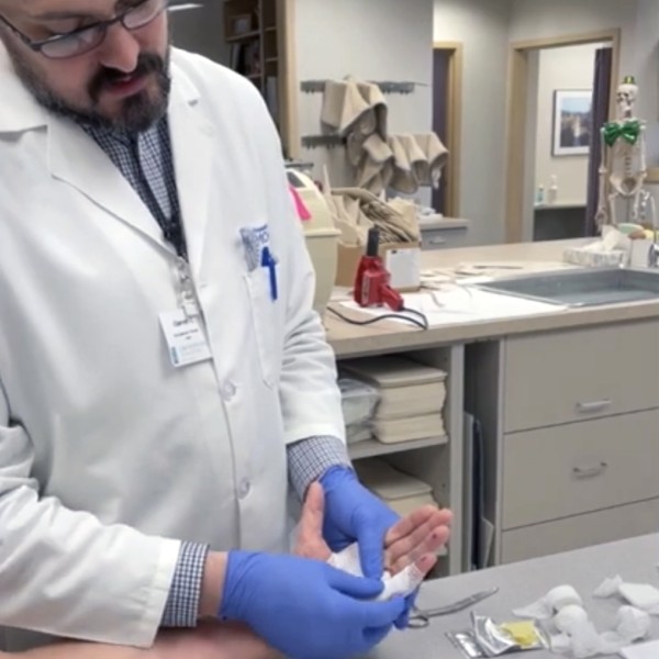 Oam Hand To Shoulder Therapy Garrett Shows A Patient How To Bandage His Hand & Do Hand Exercises